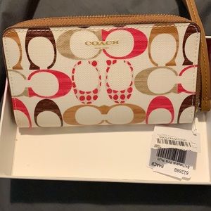NIB Coach pink and brown wristlet wallet. Brand new